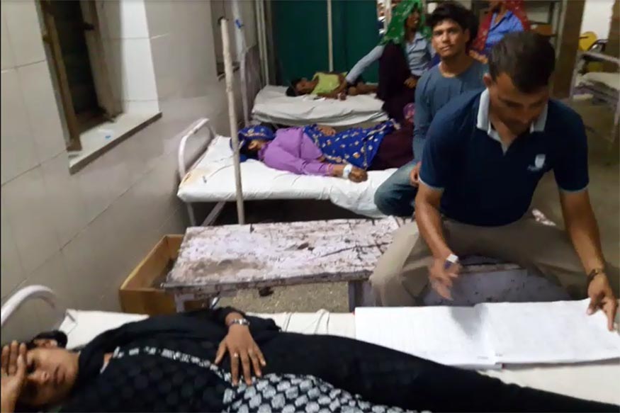 अलवर में दूषित चंदिया खाने से 100 से अधिक लोग बीमार - News 18 इंडिया