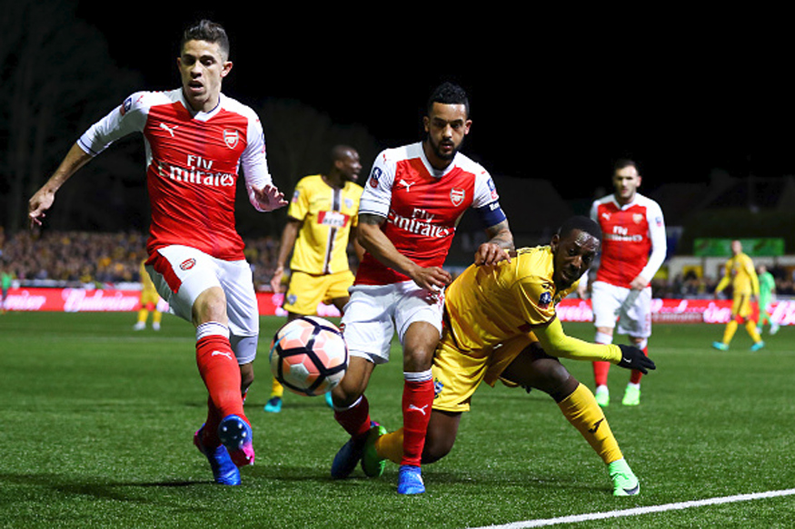 Ton-up Walcott Ends Sutton's FA Cup Dream